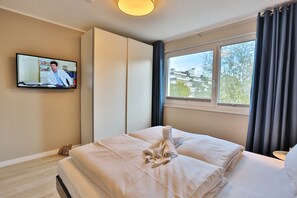 2 عدّة غرف نوم ومكواة/لوح كي وواي فاي مجانًا