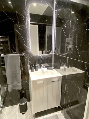 Shower, towels, toilet paper