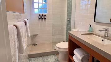 Bathtub, hair dryer, towels