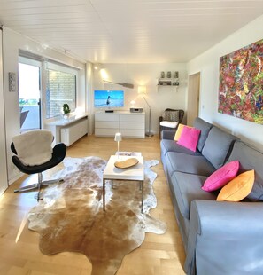 TV, DVD player, stereo - Strand und Meer Appartement 1 (Scharbeutz)