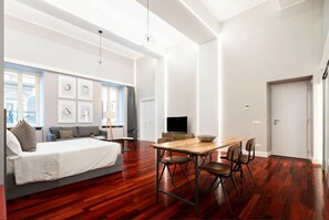Deluxe Condo | Living area | 40-inch flat-screen TV with digital channels, TV - Croce Apartments (Rome)