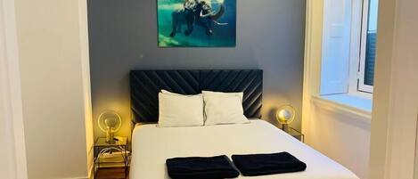 1 bedroom, desk, iron/ironing board, travel cot