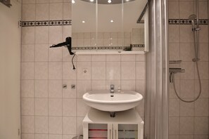 Shower, hair dryer