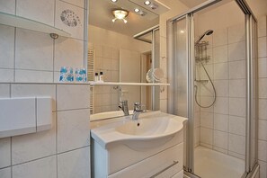 Douche, sèche-cheveux
