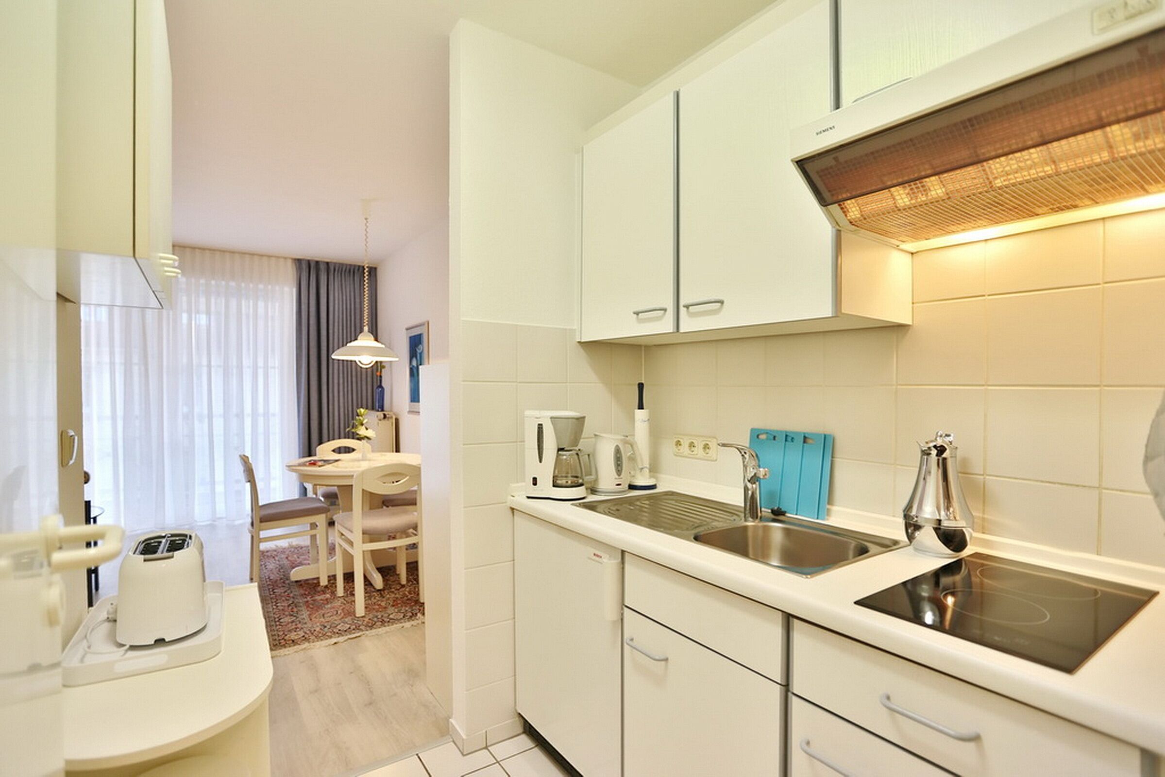 Fridge, stovetop, coffee/tea maker, toaster