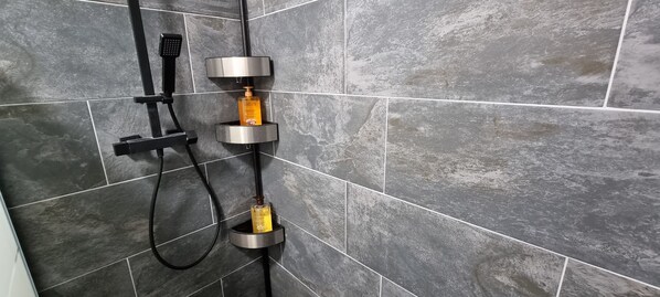 Shower, hair dryer, towels, soap