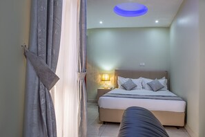 Chambre Exécutive | Surmatelas, espace de travail pour ordinateur portable, Wi-Fi gratuit