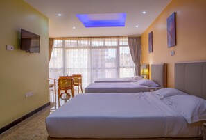 Family Room | Pillowtop beds, laptop workspace, free WiFi, bed sheets