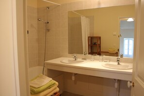 Combined shower/tub, hair dryer, towels, soap