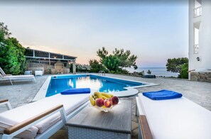 Outdoor pool - A seafront villa with swimming pool (Achlia)