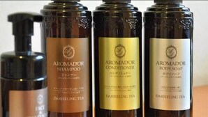 Four bottles of Darjeeling tea-based personal care products.