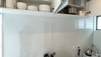 Fridge, microwave, stovetop, cookware/dishes/utensils