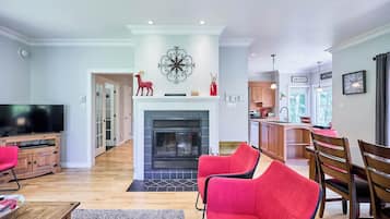 TV, fireplace, books