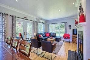 TV, fireplace, books