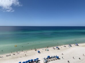 On the beach, sun loungers, beach towels