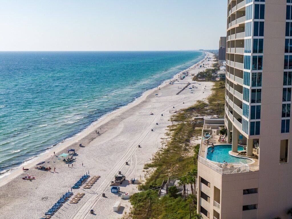 On the beach, sun loungers, beach towels