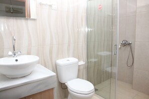 Family Apartment, 2 Bedrooms | Bathroom | Combined shower/bathtub, towels, toilet paper