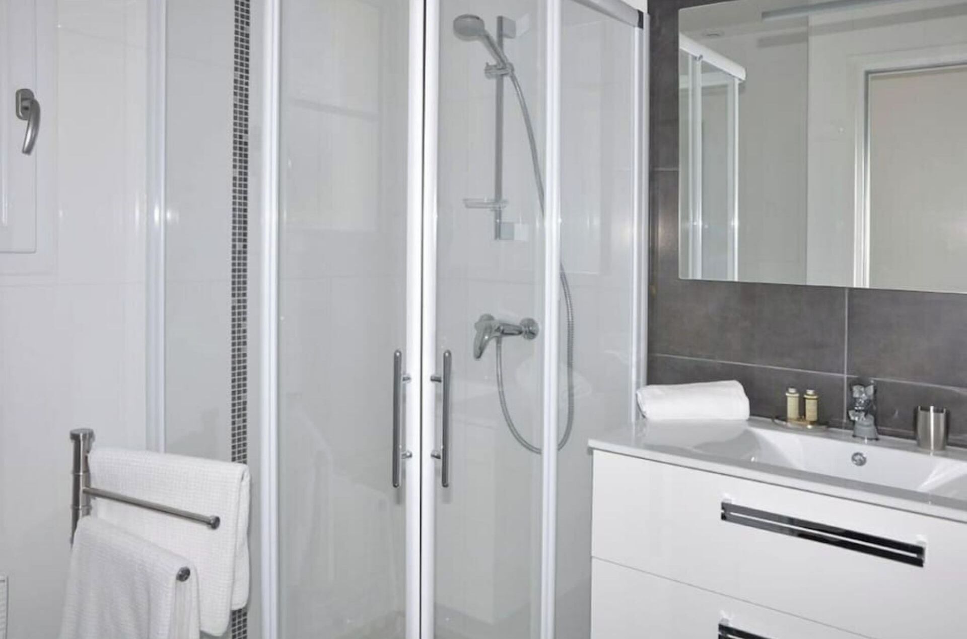 Shower, hair dryer, soap, shampoo