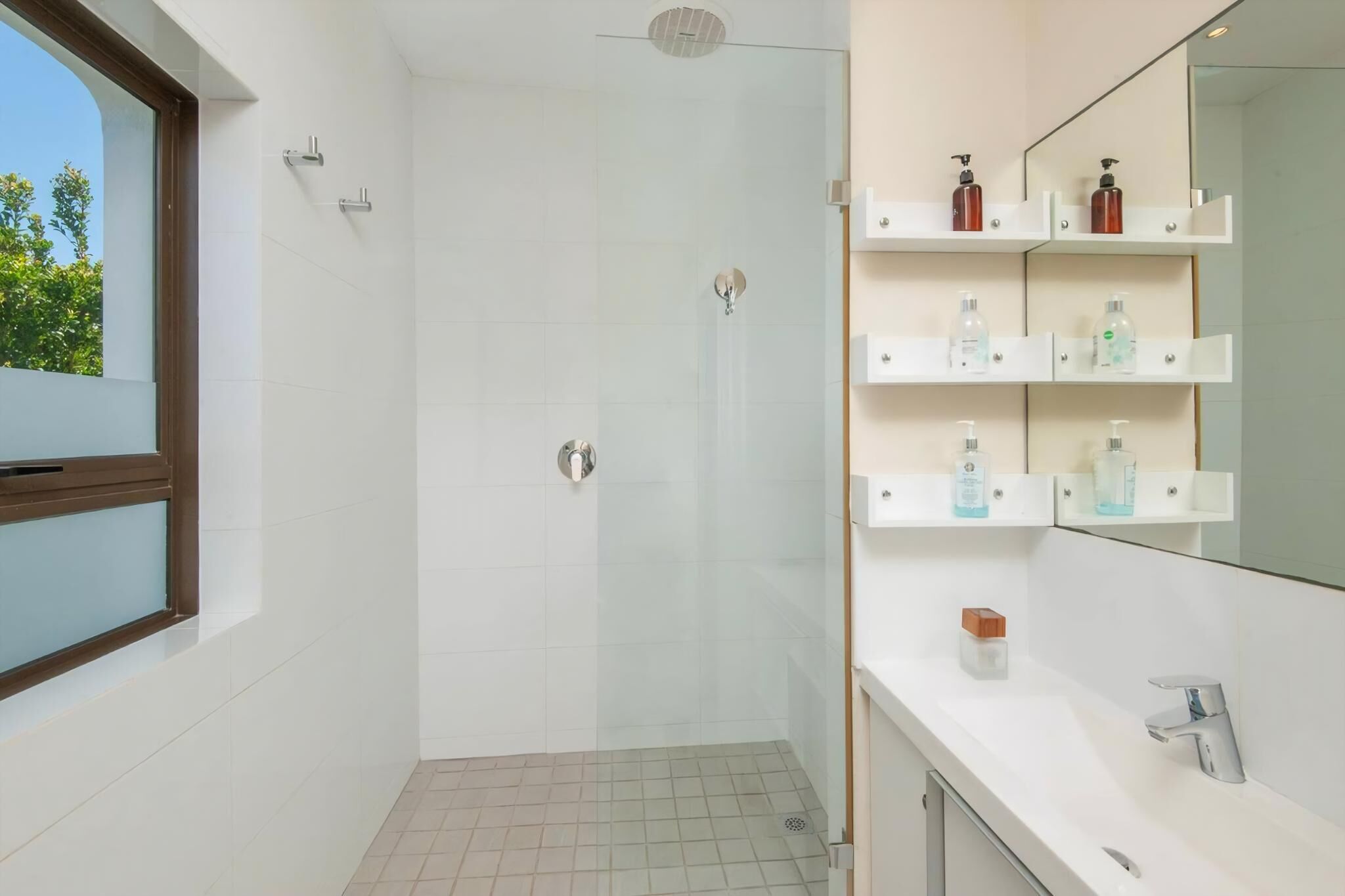 Bathtub, hair dryer, soap, shampoo