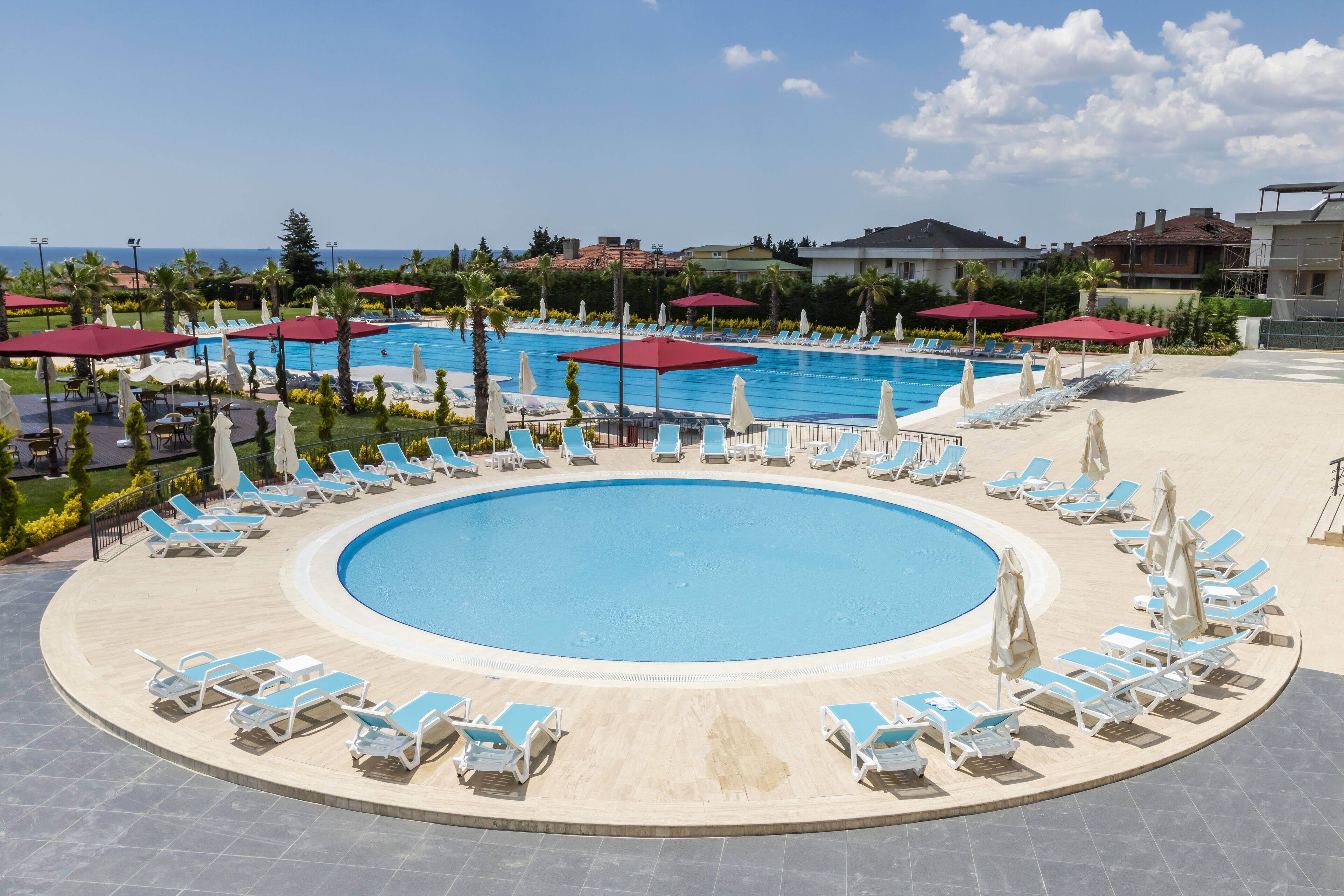 2 indoor pools, seasonal outdoor pool, pool umbrellas, pool loungers