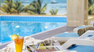 2 indoor pools, seasonal outdoor pool, pool umbrellas, sun loungers