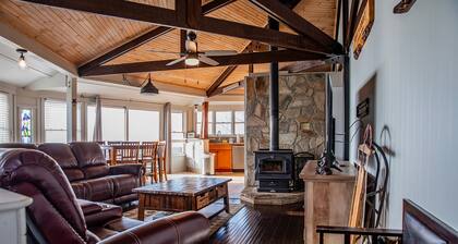 Home overlooking the mountains with a spacious deck, firepit, grill, W/D, & AC