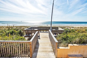 Walk along the boardwalk to the serene ocean views and enjoy the surrounding natural beauty.