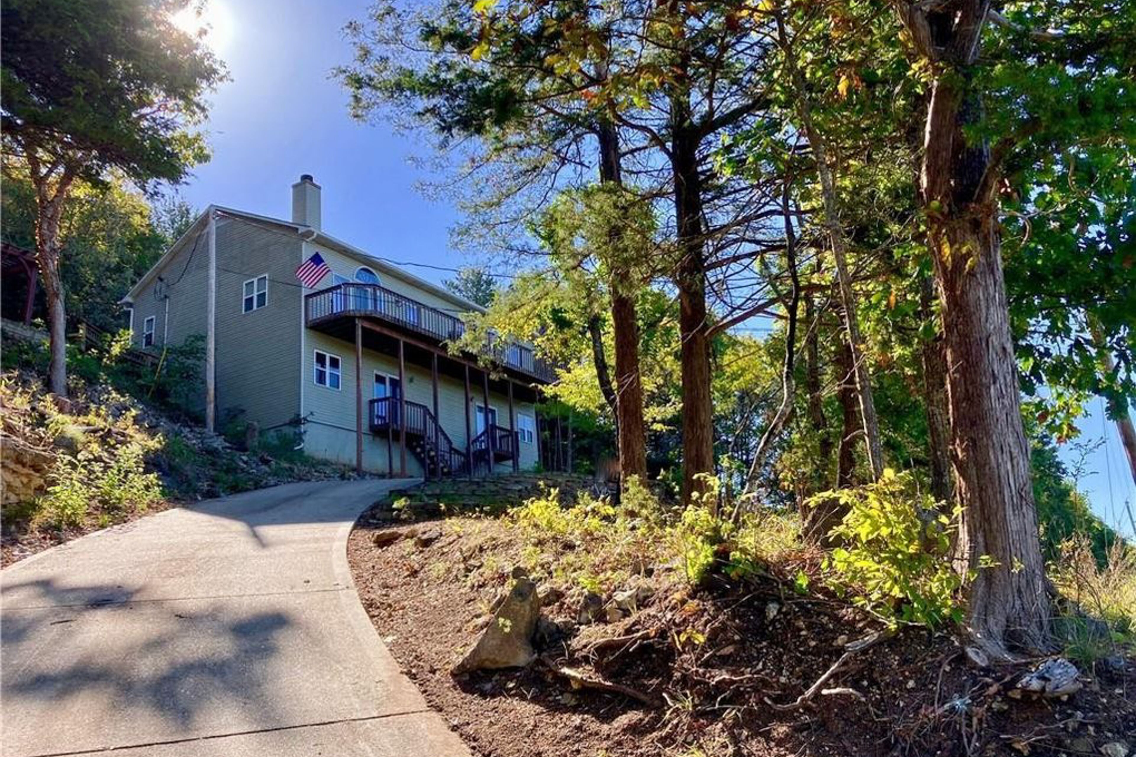 Beautiful home with extraordinary lake views from large deck & modern amenities
