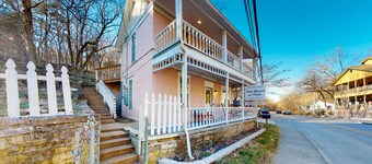 Lower-level dog-friendly home with a porch, AC, parking & washer/dryer