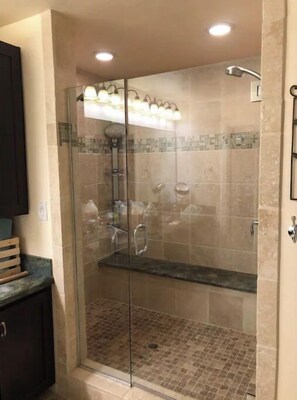 Shower, hair dryer, towels, soap