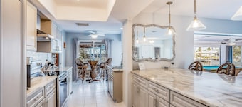 Beautiful waterfront home with pool, game room, & dog-friendly