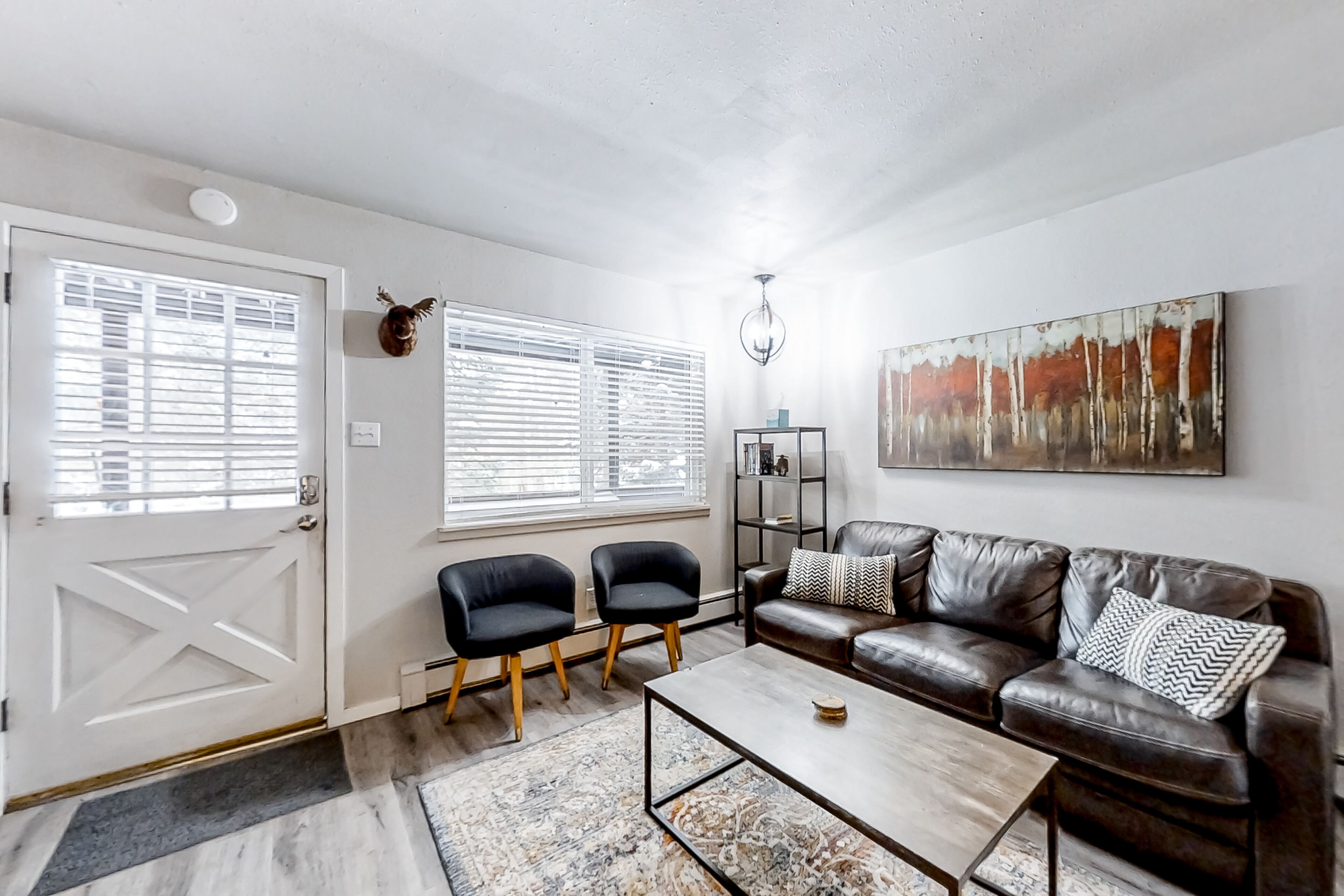 Updated condo on bus line with indoor pool, hot tub, & wood-burning fireplace