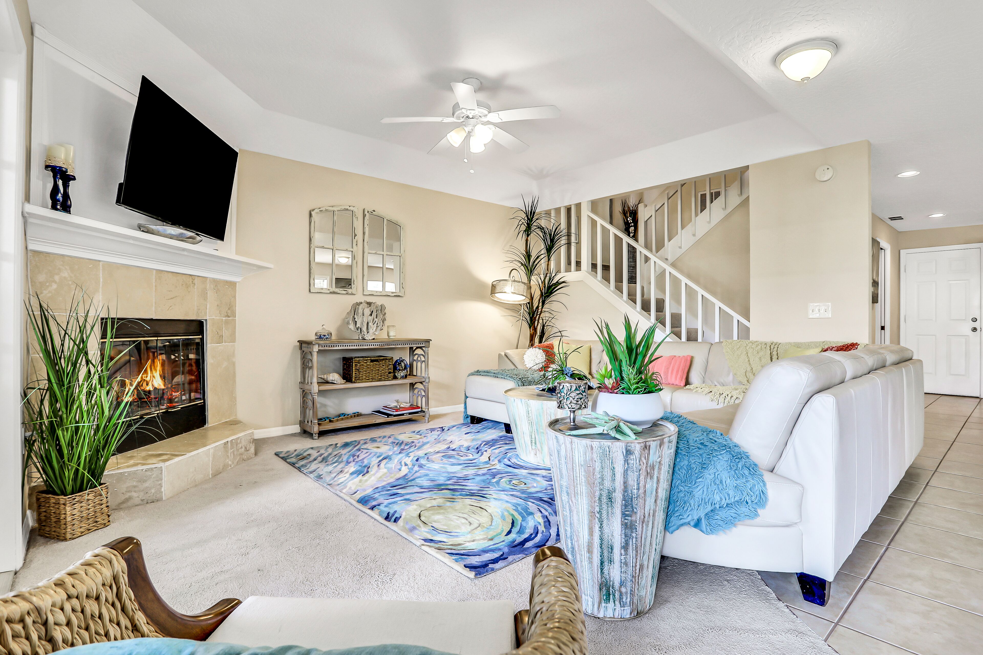 Dog-friendly duplex with fenced yard, central AC, W/D, bikes, & office space