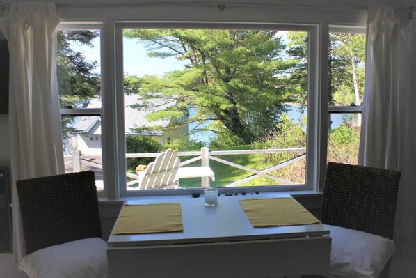 Beautiful ocean views from the cozy dining table for two
