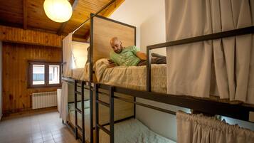 Premium bedding, pillow-top beds, laptop workspace, free WiFi