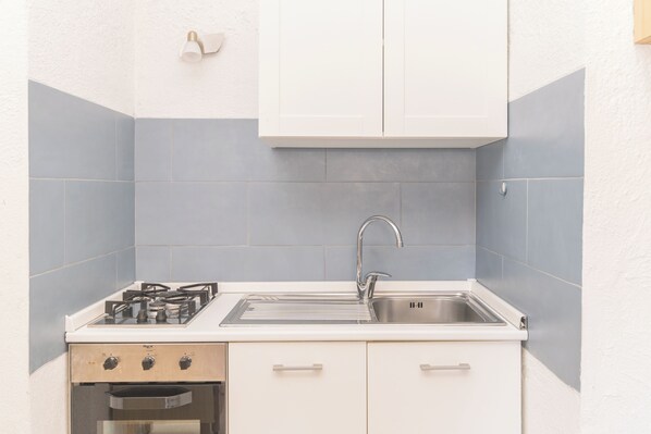 Standard Apartment, Multiple Bedrooms (Piazzetta Bilo Porto 50m From The) | Private kitchen | Fridge, oven, stovetop, coffee/tea maker