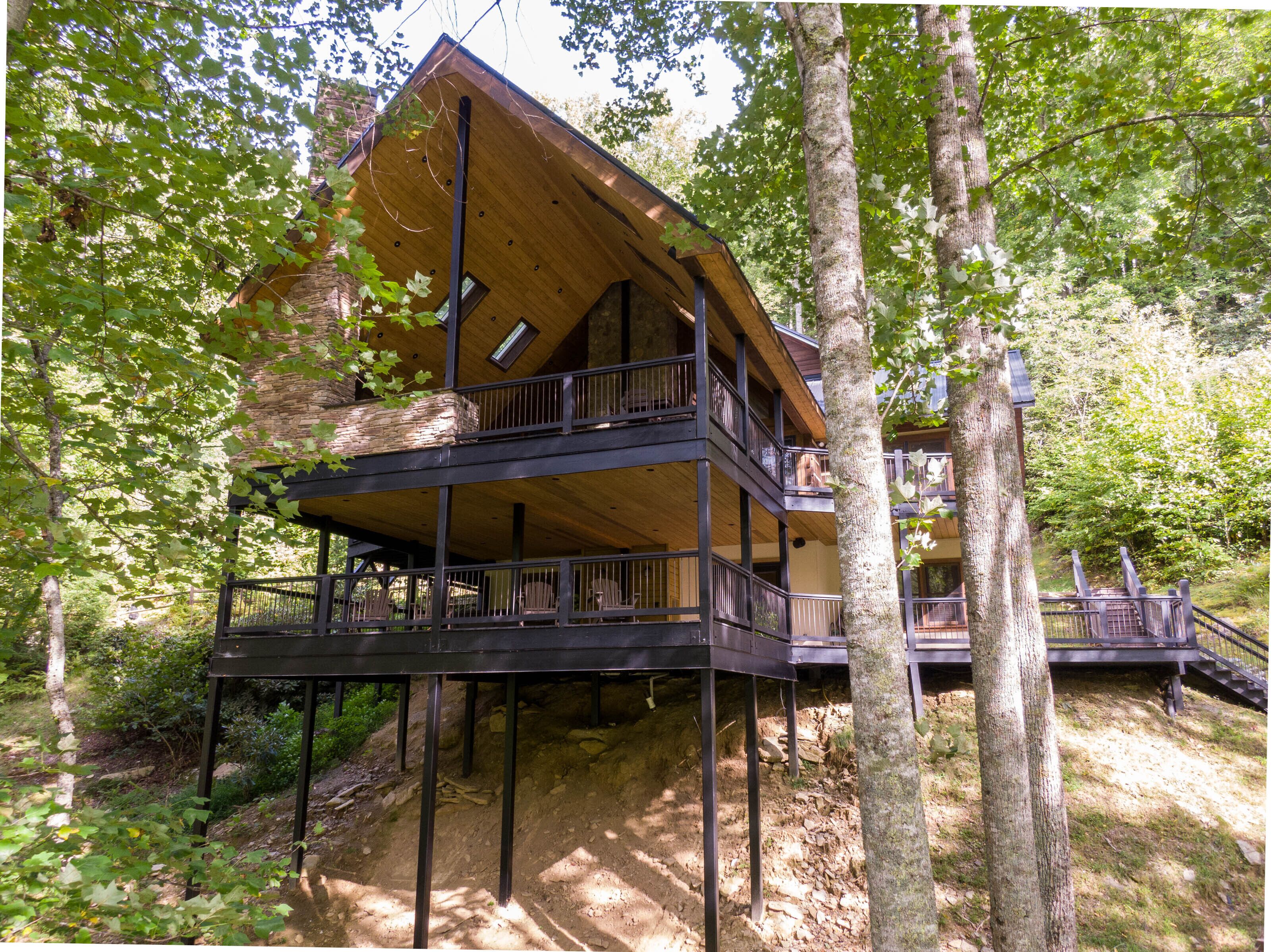Tucked into the hardwoods, Lakeview rises three levels with wraparound decks perfect for soaking in the Blue Ridge surroundings.