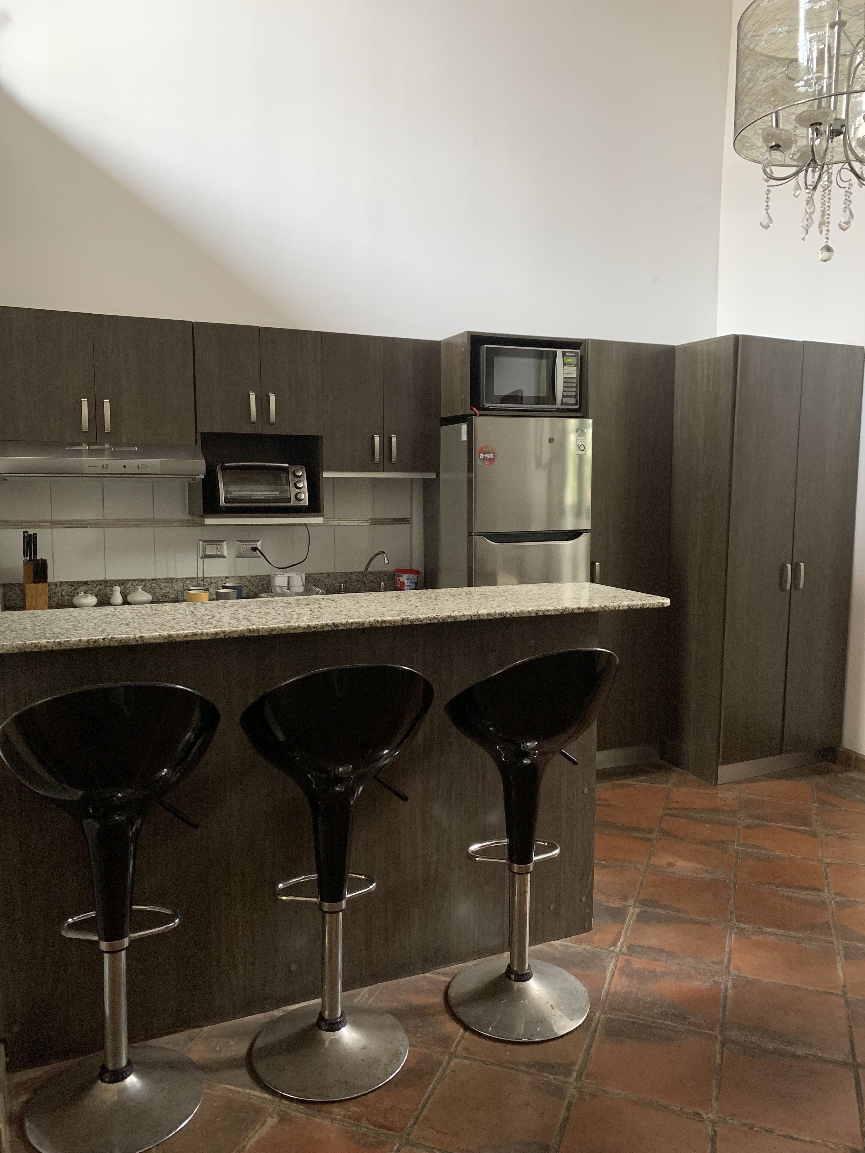 Traditional Apartment | Private kitchen | Microwave, oven, toaster, blender