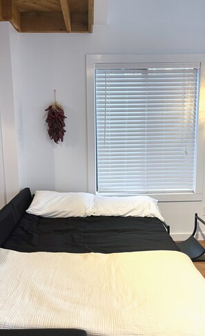 2 habitaciones, tabla de planchar con plancha y wifi gratis 