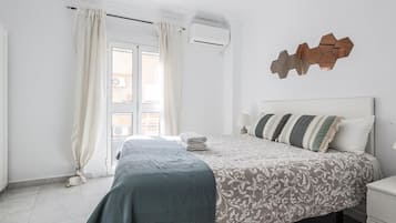 2 slaapkamers, een strijkplank/strijkijzer, internet