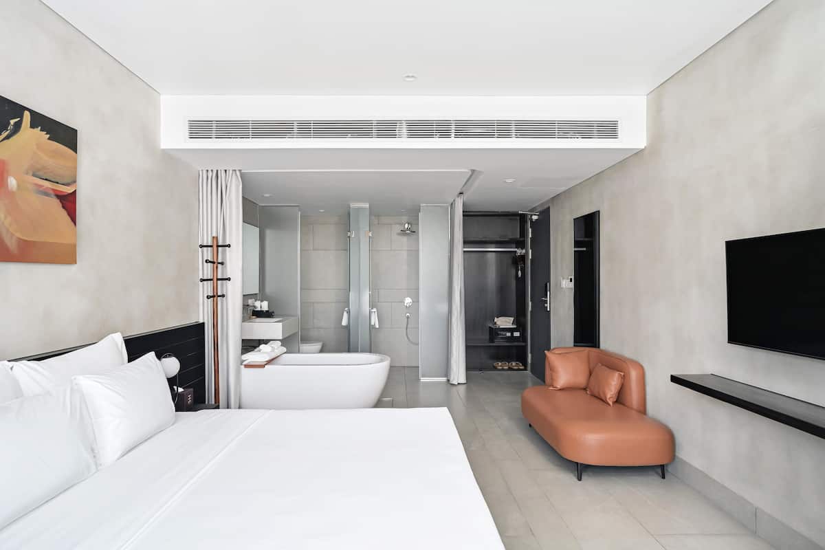 Ropa de cama de alta calidad, minibar, caja fuerte y escritorio