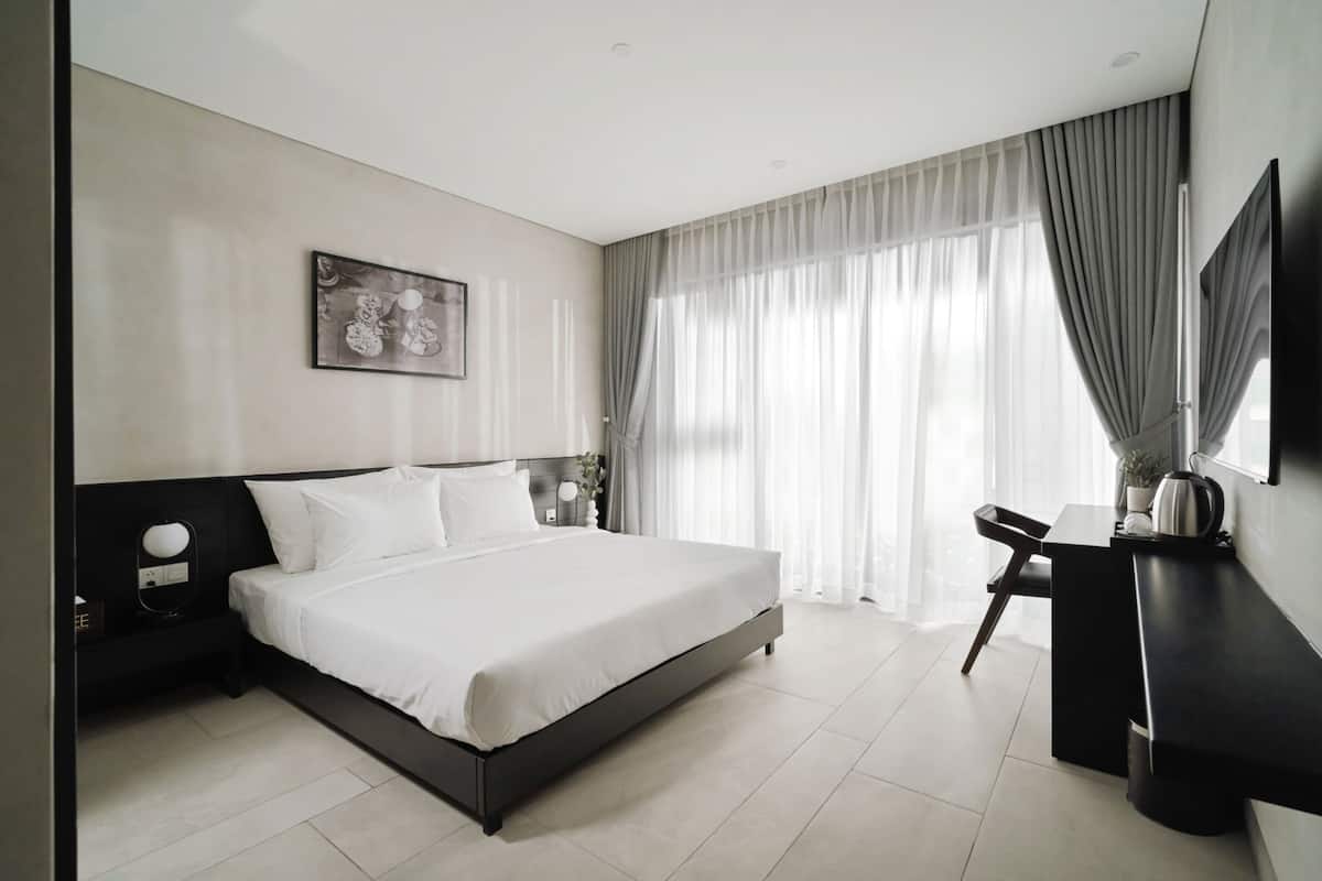 Habitación Deluxe doble | Ropa de cama de alta calidad, minibar, caja fuerte y escritorio