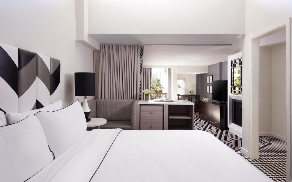 Decompress and Destress at an Elegant Suite with a Rooftop Pool, Four Units!