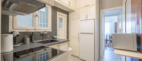 Microwave, stovetop, coffee/tea maker, electric kettle