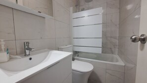 Bathtub, hair dryer