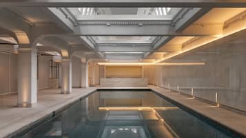 Indoor pool, open 6:00 AM to 10:00 PM, pool loungers