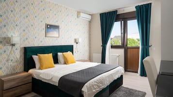 Cortinas blackout, tabla de planchar con plancha y wifi gratis