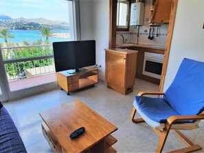 Enjoy a scenic sea view from the balcony, with a flat-screen TV and kitchenette for your convenience.