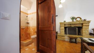 Bathtub, hair dryer, towels, soap