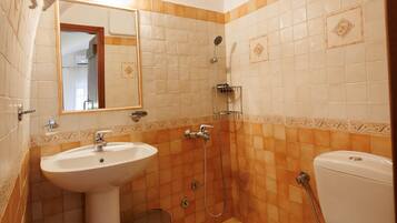 Bathtub, hair dryer, towels, soap